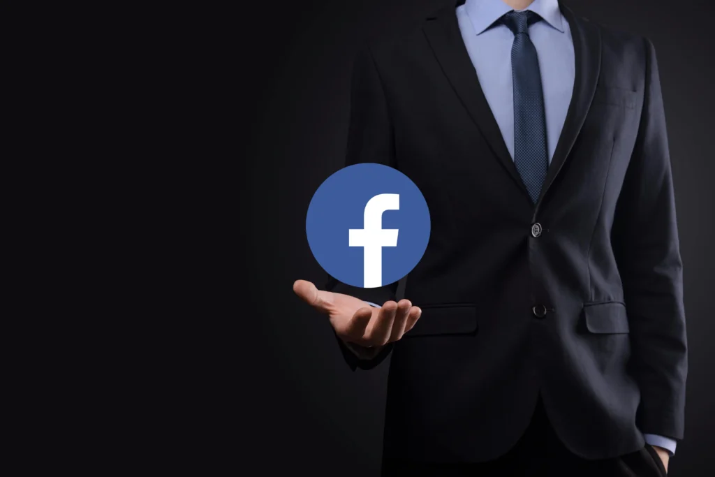 onok-ukraine-july-14-2021-businessman-holds-clicks-facebook-icon-his-hands-social-network-global-net facebook